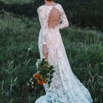 Backless wedding dress with shaped cut from behind by Anna Skoblikova