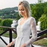 Short lace wedding dress with a v-neck by Anna Skoblikova